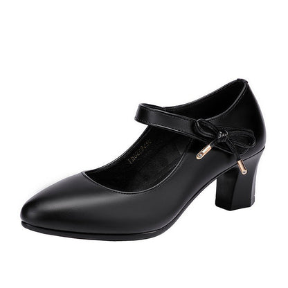 Chic Mid-Heel Buckle Pumps by Sophie Laurie