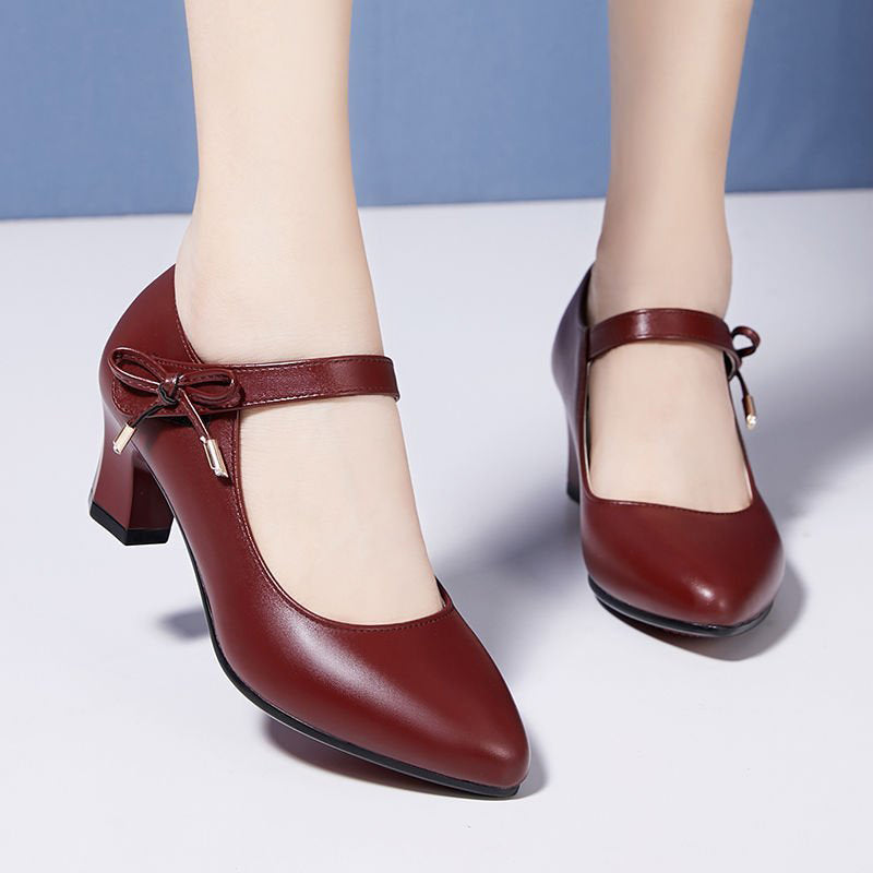 Chic Mid-Heel Buckle Pumps by Sophie Laurie