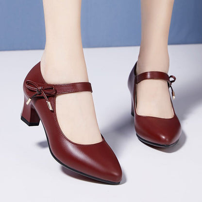 Chic Mid-Heel Buckle Pumps by Sophie Laurie