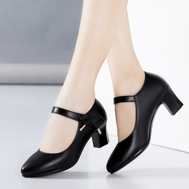 Chic Mid-Heel Buckle Pumps by Sophie Laurie