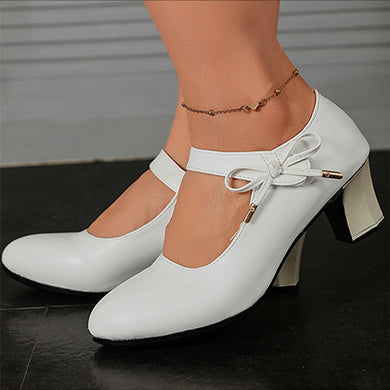 Chic Mid-Heel Buckle Pumps by Sophie Laurie